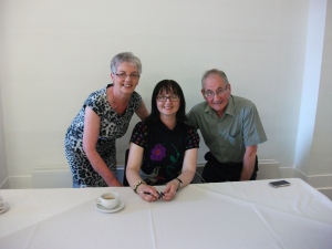 Michelle and her parents at a recent book signing.